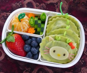 food packed neatly in compartments in bento box